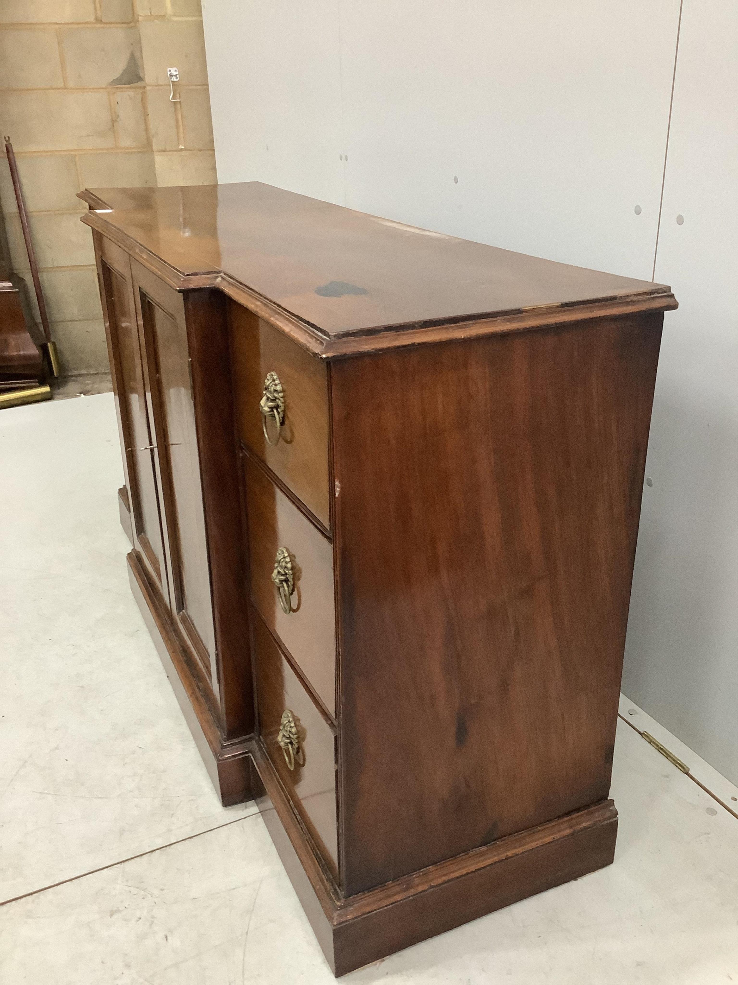 A George IV style mahogany breakfront dwarf cabinet, width 152cm, depth 49cm, height 87cm. Condition - fair, top has a large dark blemish